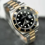 ساعت مچی رولکس ساب‌مارینر | Rolex Submariner | نقره ای-طلایی-مشکی صفحه مشکی رپلیکا ایتالیا